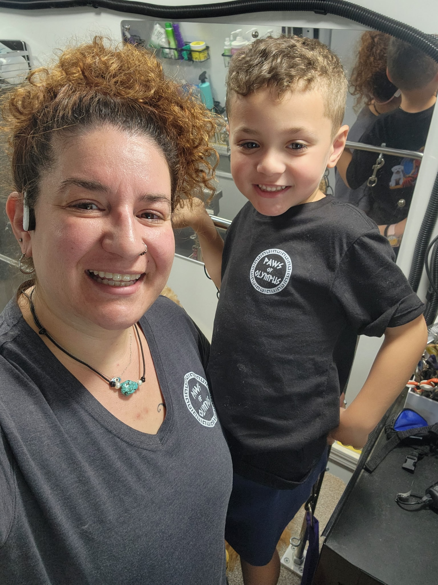 Photo of groomer and her helper, assistant J